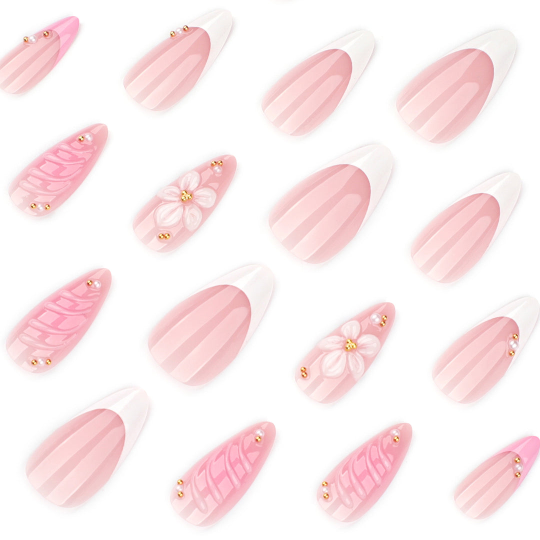 Artificial nail art with floral design and glitter accents Stornfield