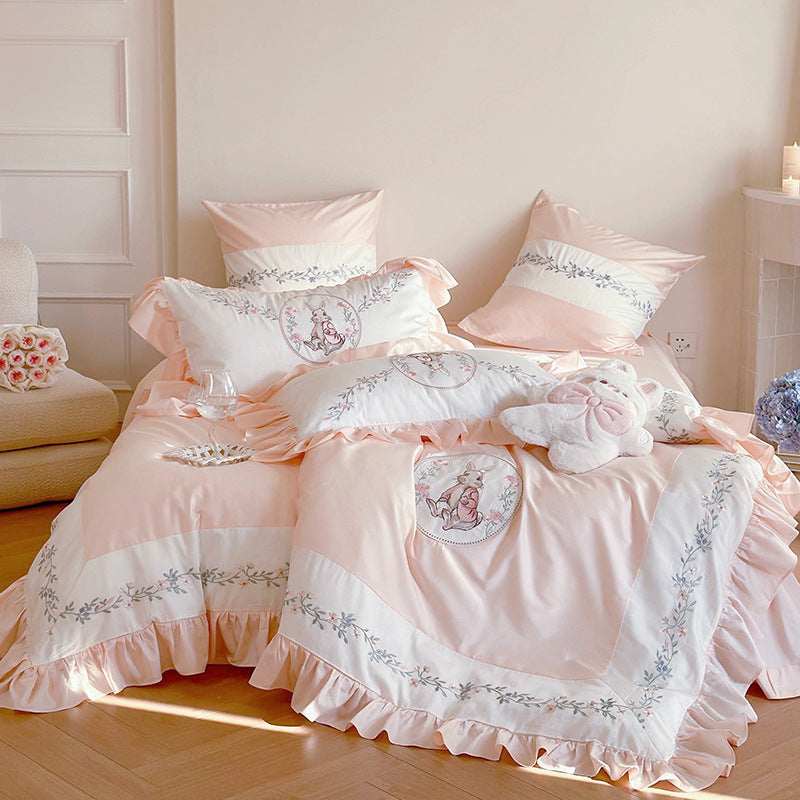 Bedding set with romantic ruffle edge and delicate embroidery