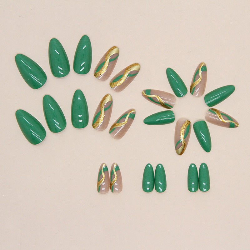 Glamorous artificial nails with elegant gold accents