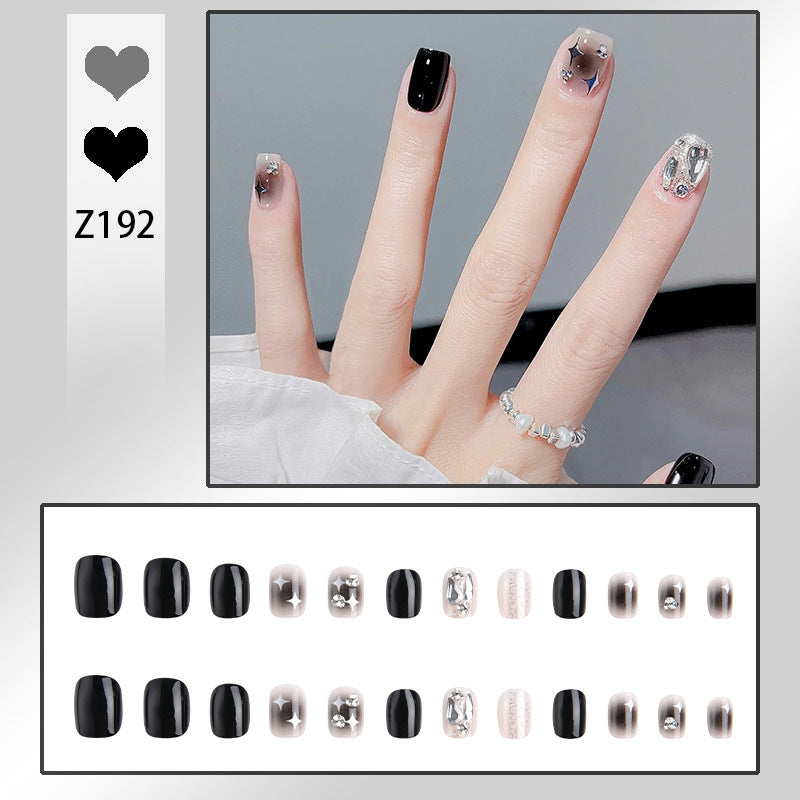 Artificial nail set with glamorous glitter and crystal decorations Stornfield