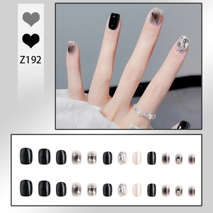 Artificial nail set with glamorous glitter and crystal decorations Stornfield