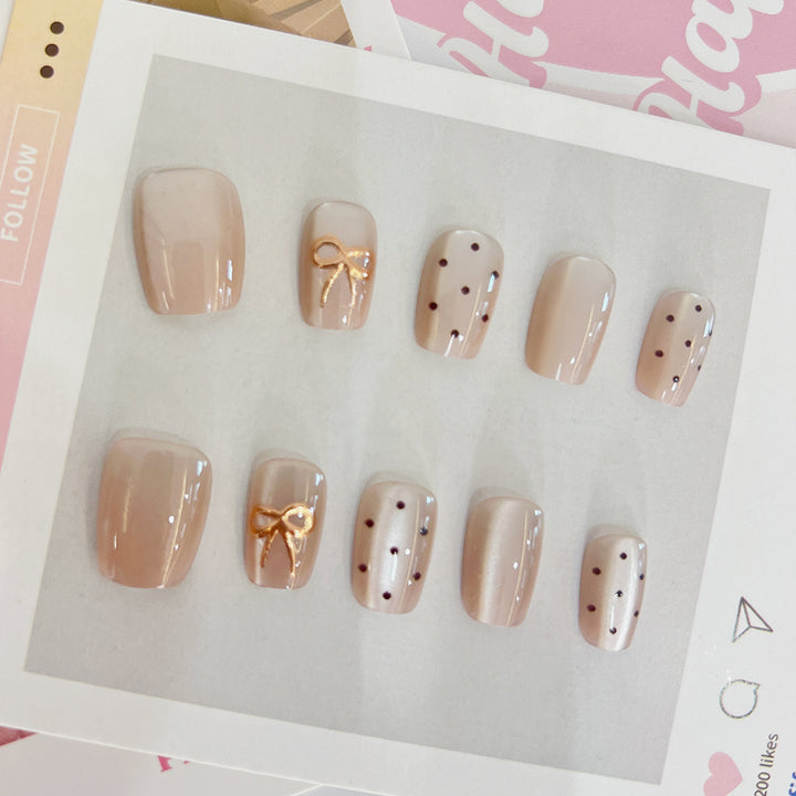 Artificial nail tips with elegant bow designs Stornfield