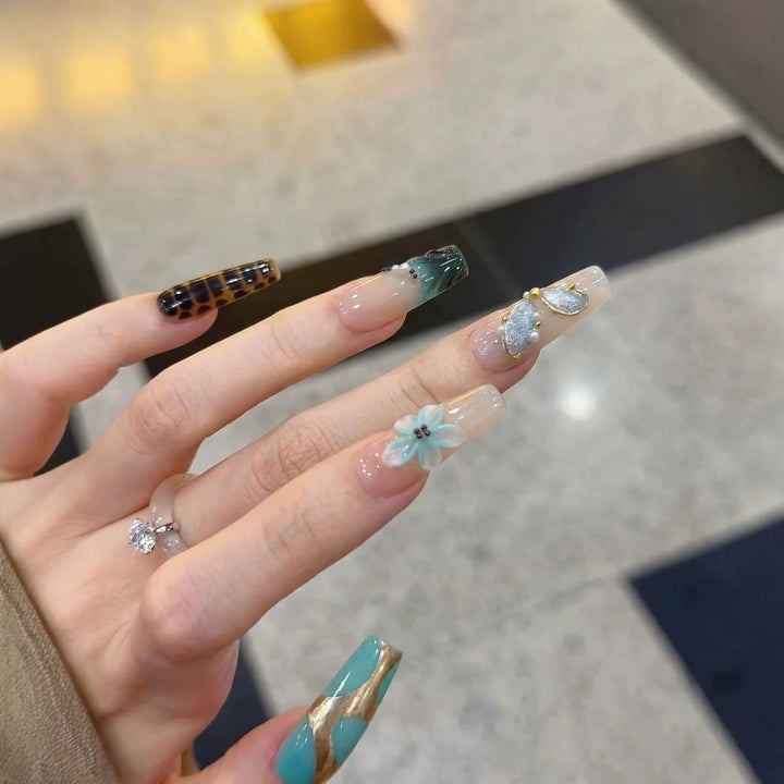 Artistic Press-On Nail Art Set with Floral and Geometric Designs Stornfield