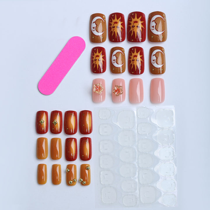 Artificial nails with floral motifs and glitter accents Stornfield