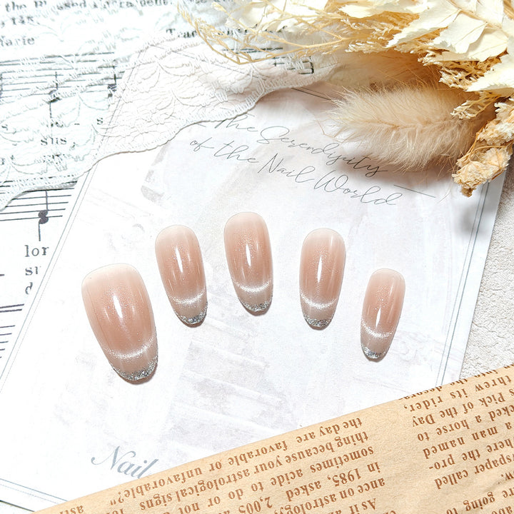 Artificial nails with elegant gloss and glitter accents Stornfield