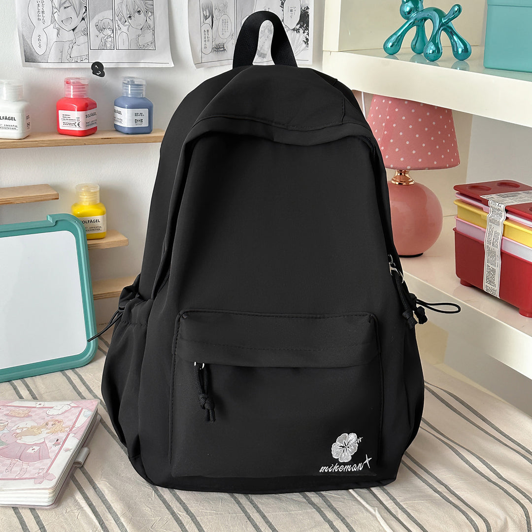 Versatile Lightweight Backpack with Decorative Accents Stornfield