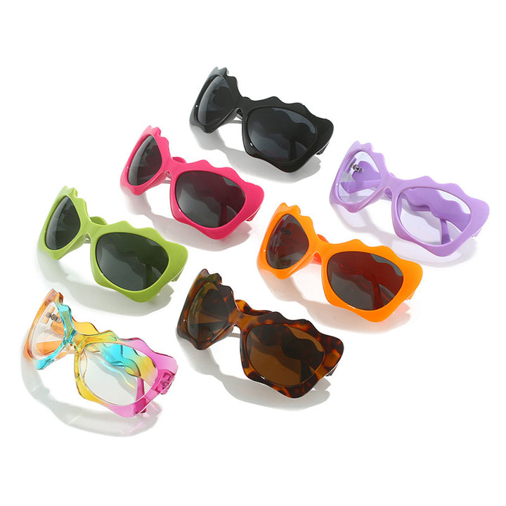 Ladies extravagant sunglasses with wavy frame design Stornfield
