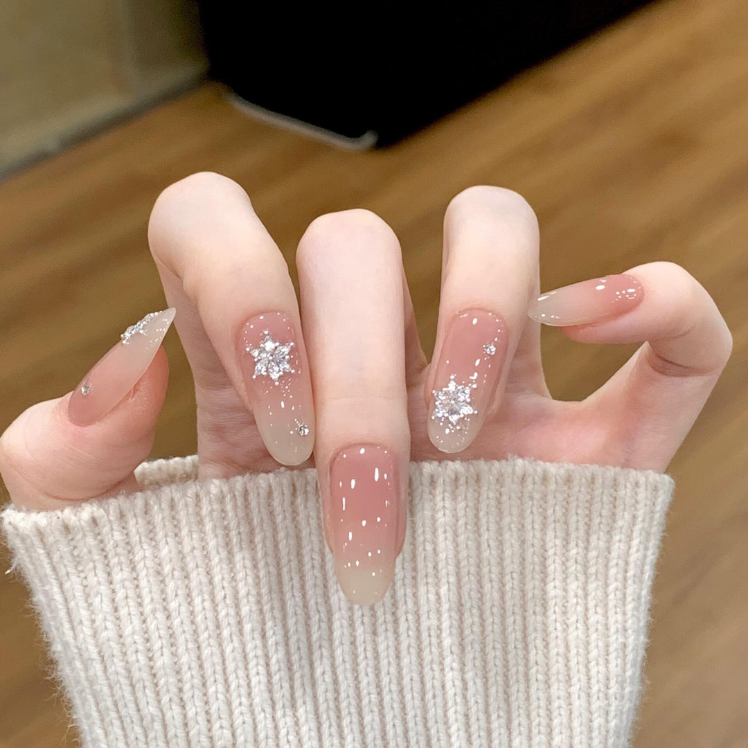 Artificial nails with shimmering effect and elegant star motif Stornfield