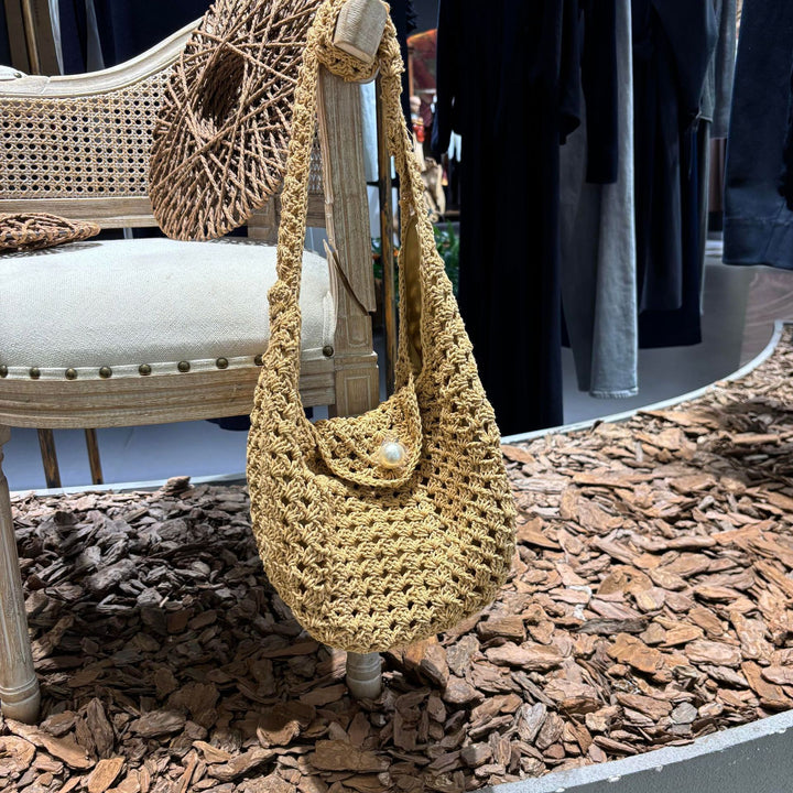 Handmade shoulder bag with bead closure Stornfield