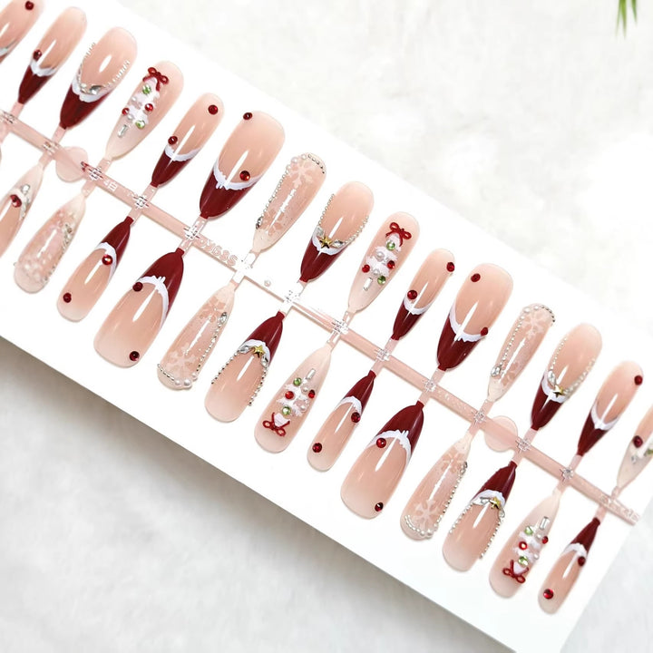 Artificial nails with festive designs and glitter accents Stornfield
