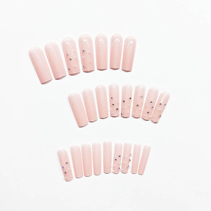 Acrylic nail set with sparkling rhinestone embellishments Stornfield