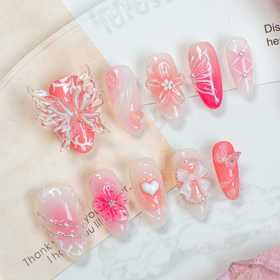 Creative print nail set with floral designs and decorative accents Stornfield