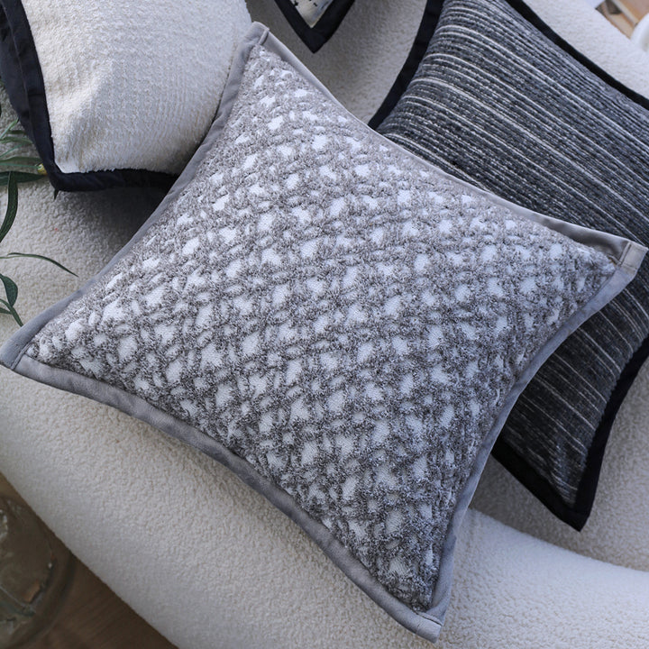 Decorative cushion with modern line pattern