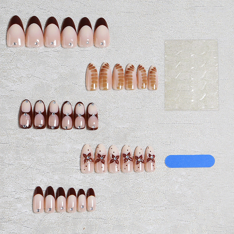 Artificial nails with elegant motif designs Stornfield