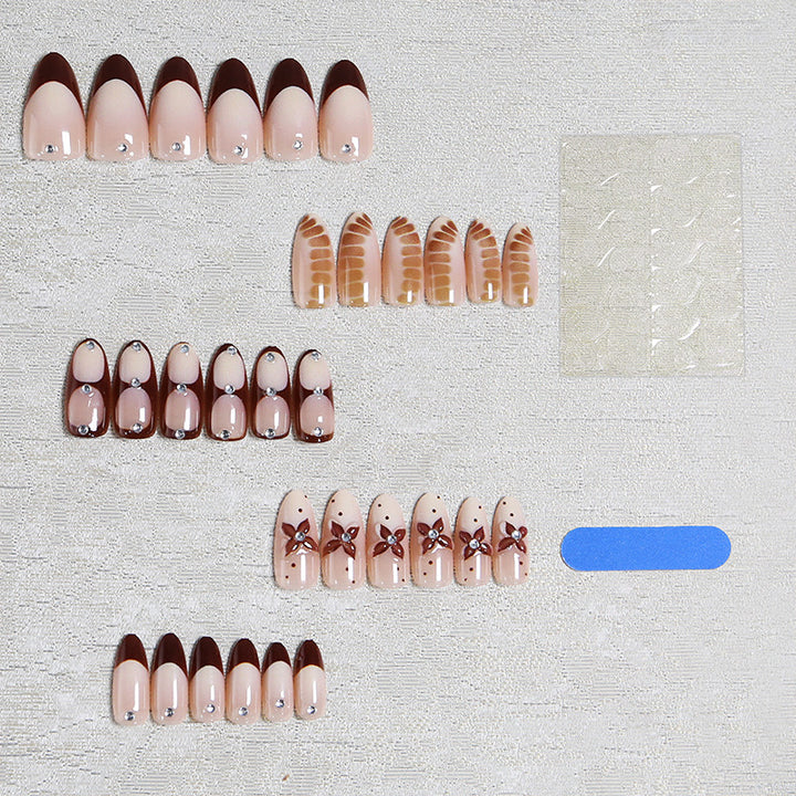Artificial nails with elegant motif designs Stornfield