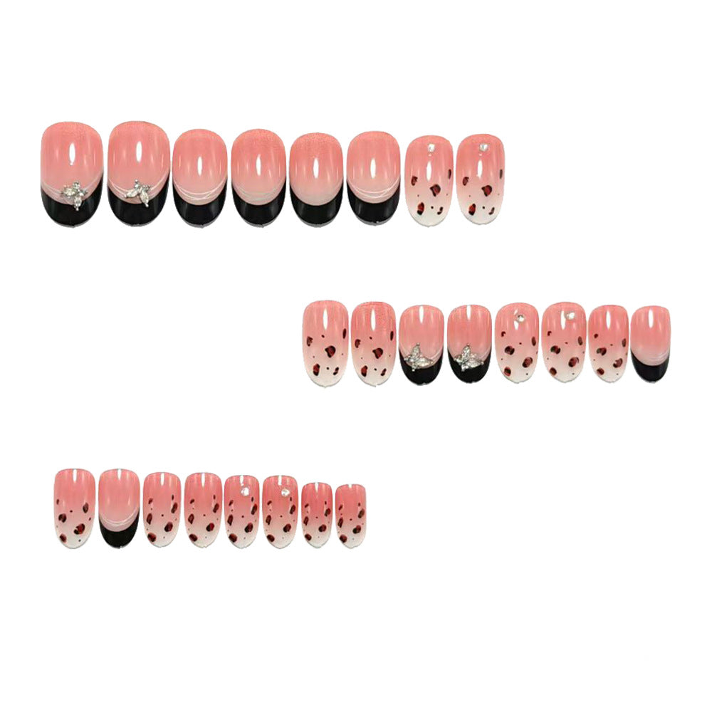 Exclusive artificial nails with dreamy heart and glitter effects Stornfield