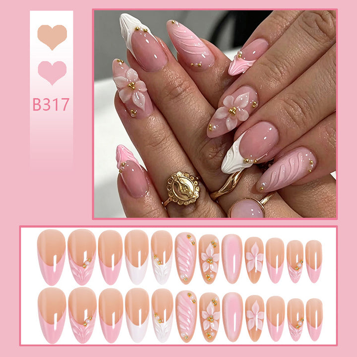 Artificial nail set with filigree floral design and elegant glitter Stornfield