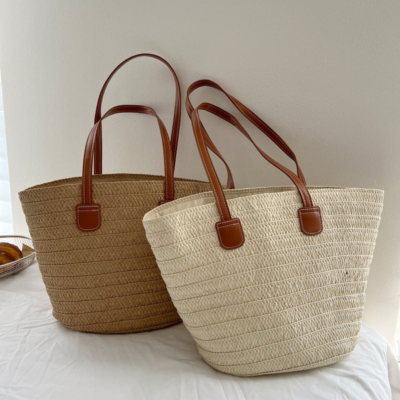 Handcrafted straw bag with elegant leather handles Stornfield