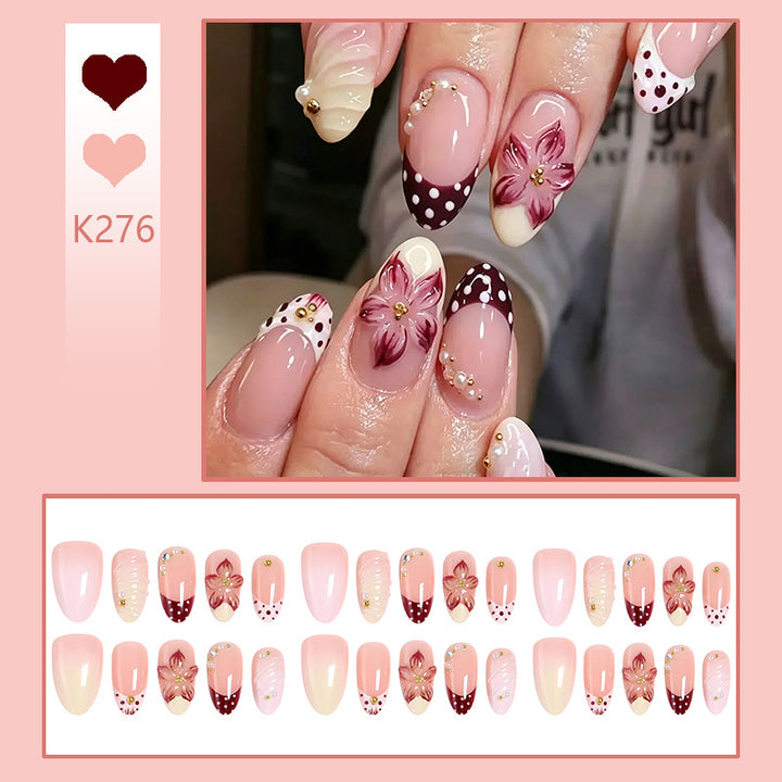 Elegant artificial nails set with floral accents Stornfield