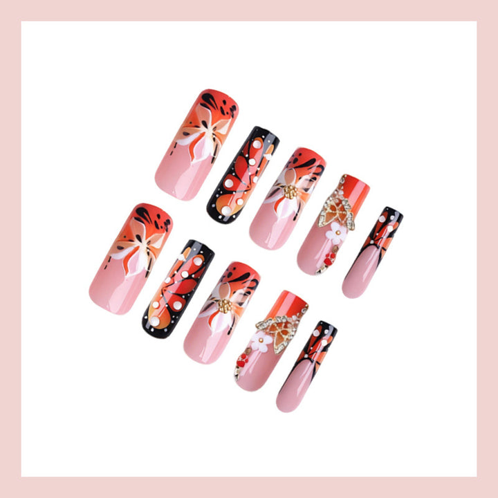 Artificial nail set with elegant floral and glamorous decorations Stornfield