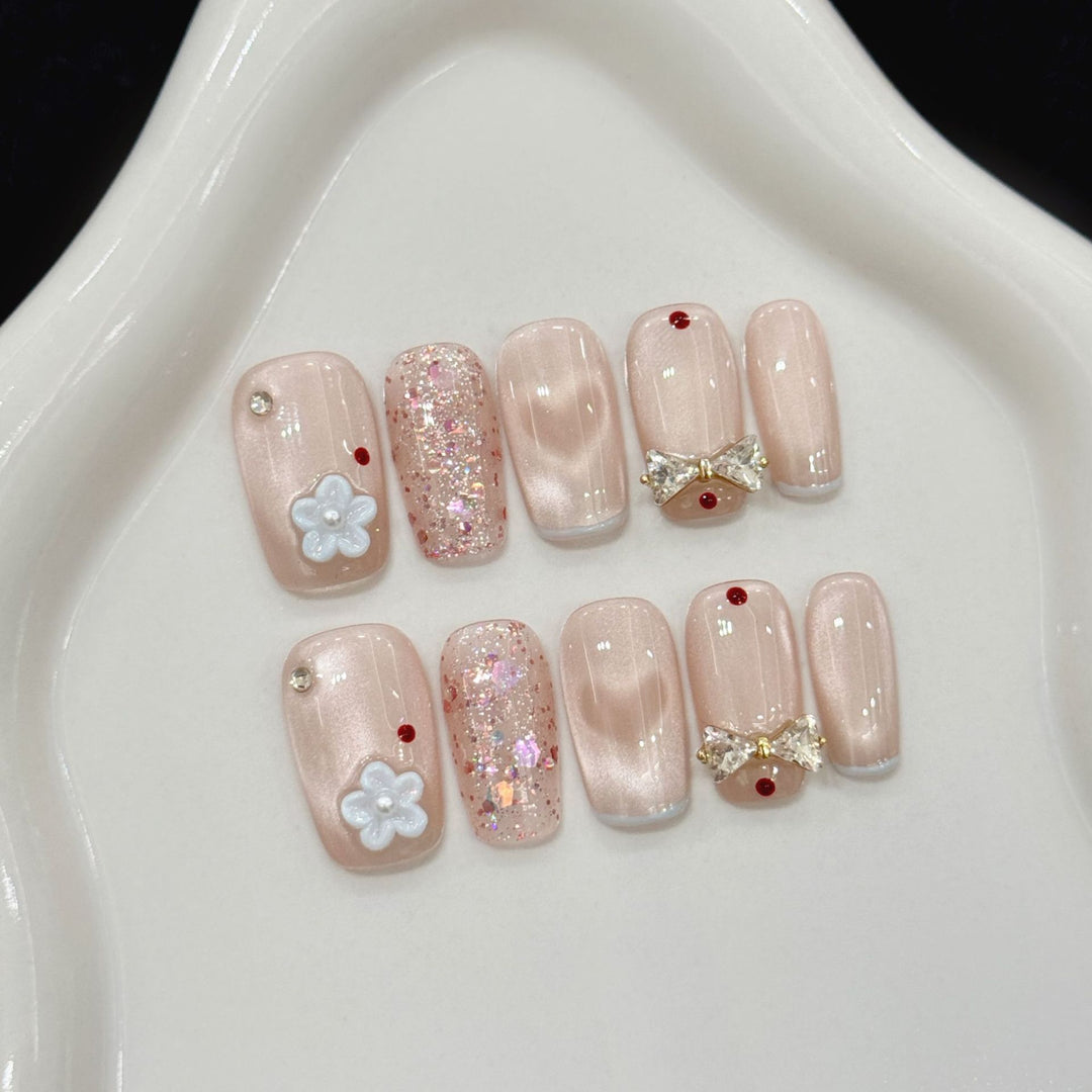 Decorative Press-On Nail Art Set with Glitter and Bow Accents