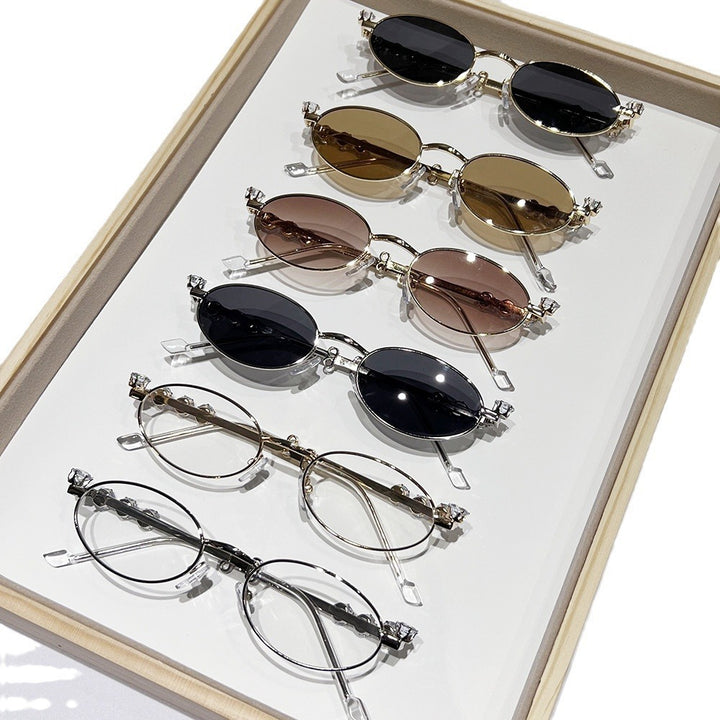 Fashion-Forward Oval Sunglasses with Crystal Accents Stornfield