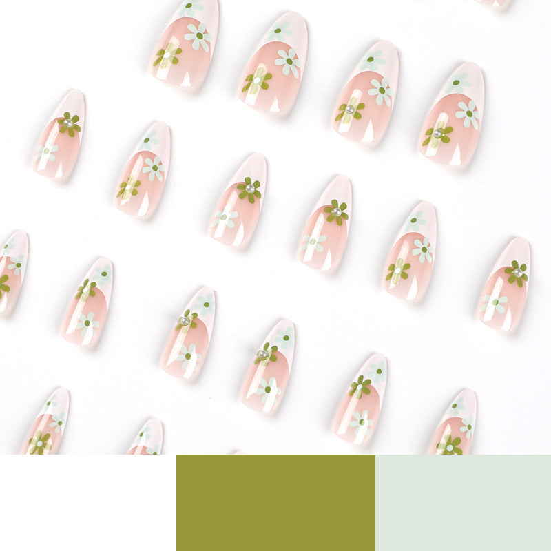 Artful nail art with delicate floral motifs Stornfield