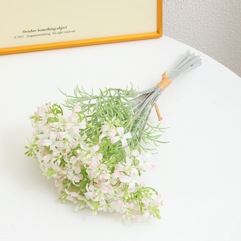 Decorative artificial flower arrangement