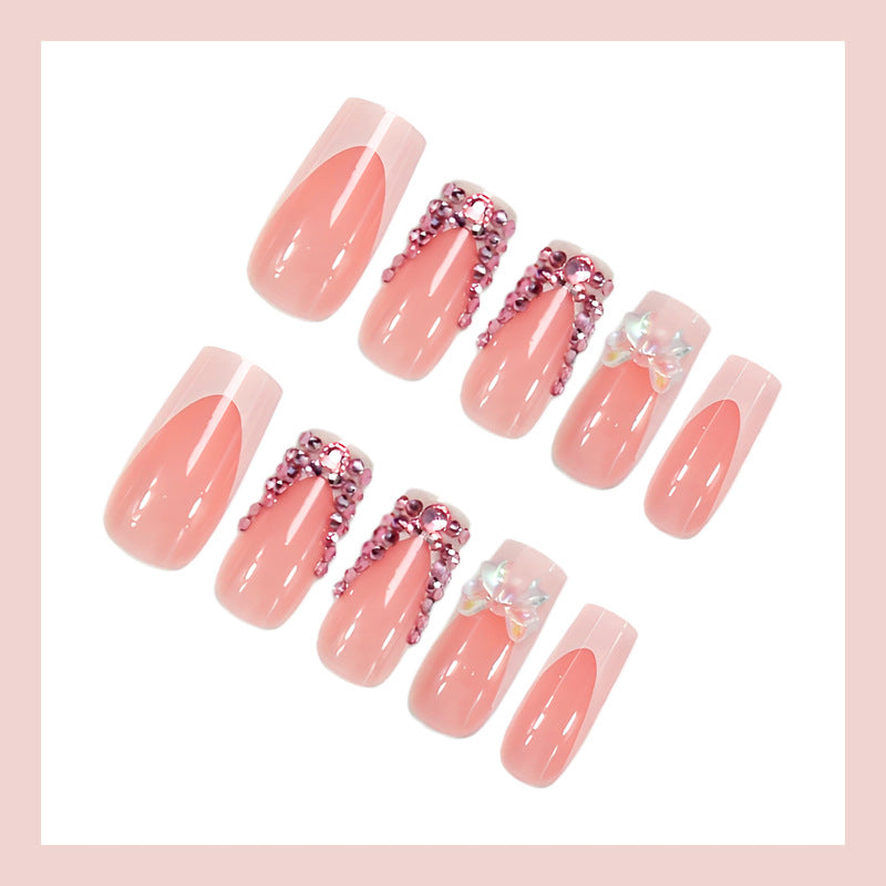 Artificial nail set with elegant glitter accents and modern designs Stornfield