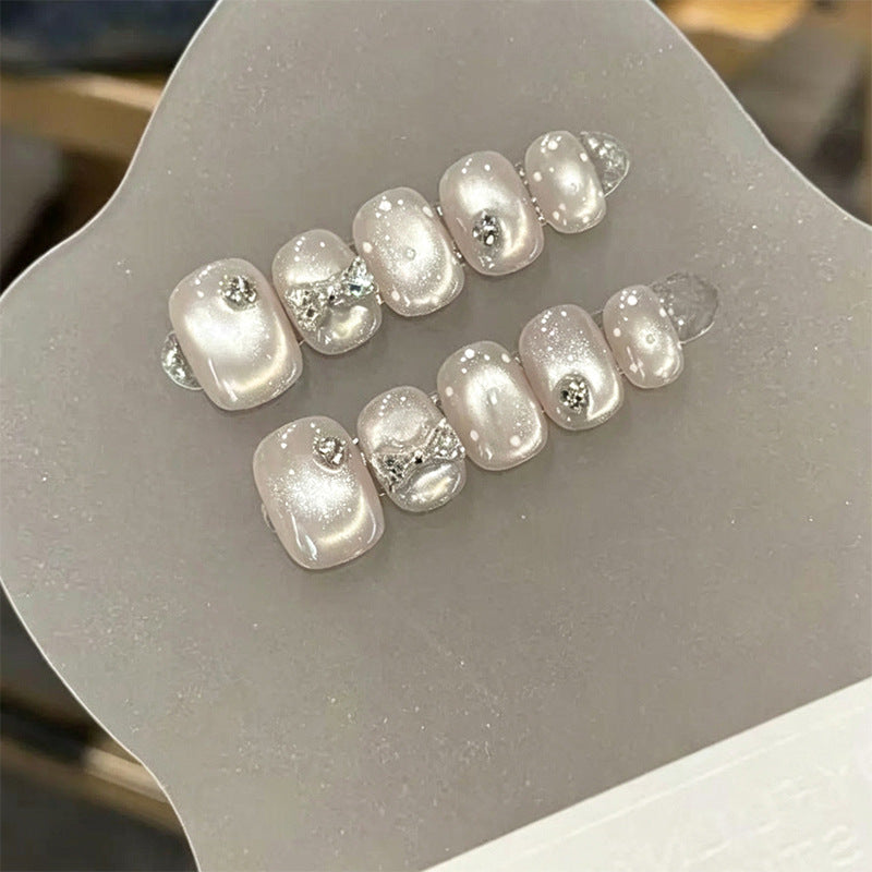 Artificial nail set with elegant glitter and crystal decorations Stornfield