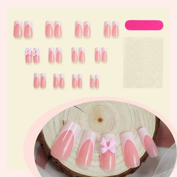 Nail set with playful bow design Stornfield
