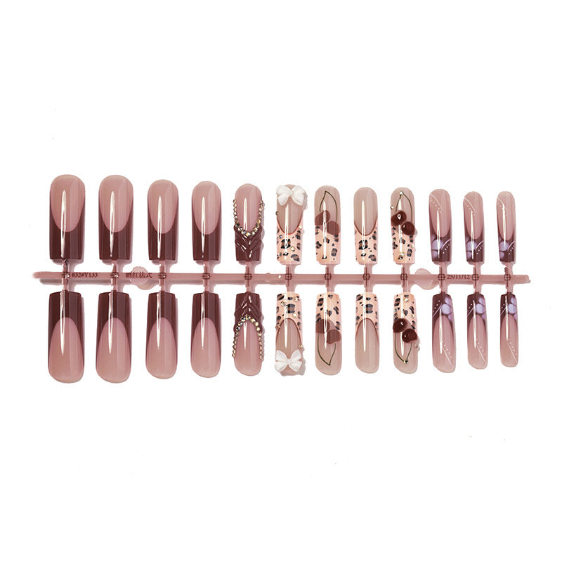 Artistic Press-On Nail Set with Decorative Accents Stornfield
