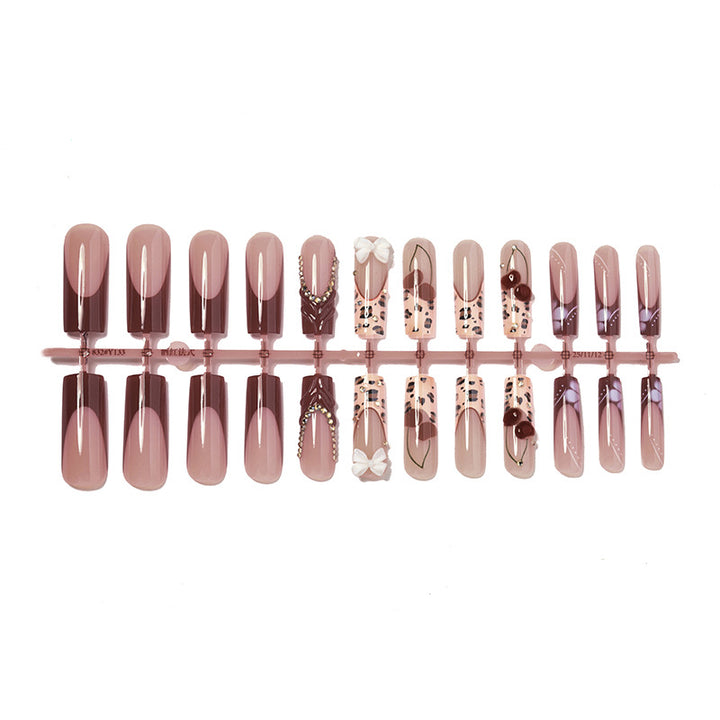 Artistic Press-On Nail Set with Decorative Accents Stornfield