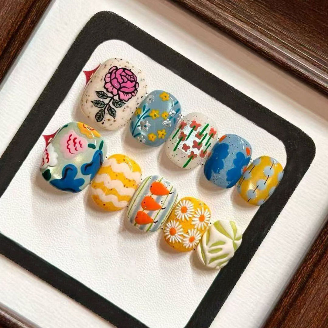 Artistic Floral and Nature-Inspired Nail Design Set Stornfield