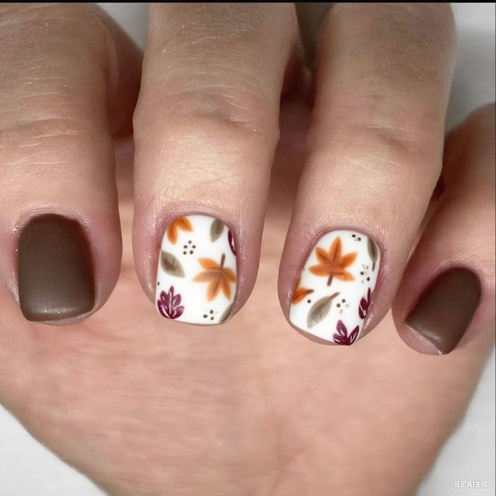 Artistic Fall-Themed Nail Art Stornfield