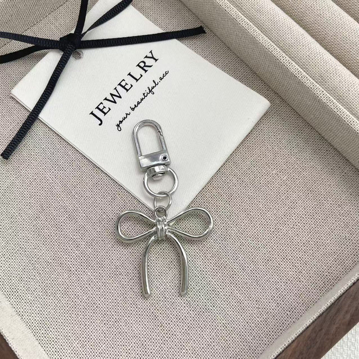 Elegant Bow-Shaped Keychain Stornfield 1787102672