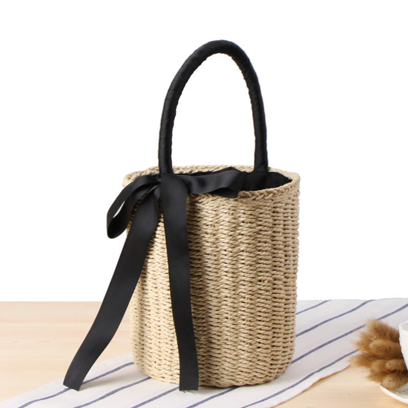 Fashionable basket bag with decorative satin ribbon Stornfield