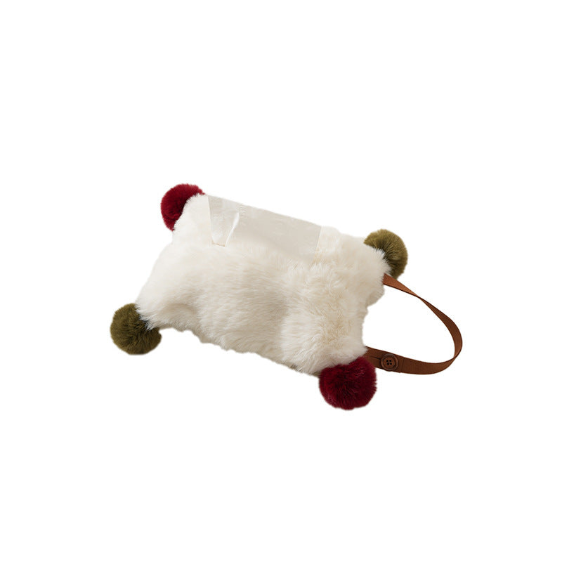 Handy tissue storage made of faux fur with leather handle and pompom