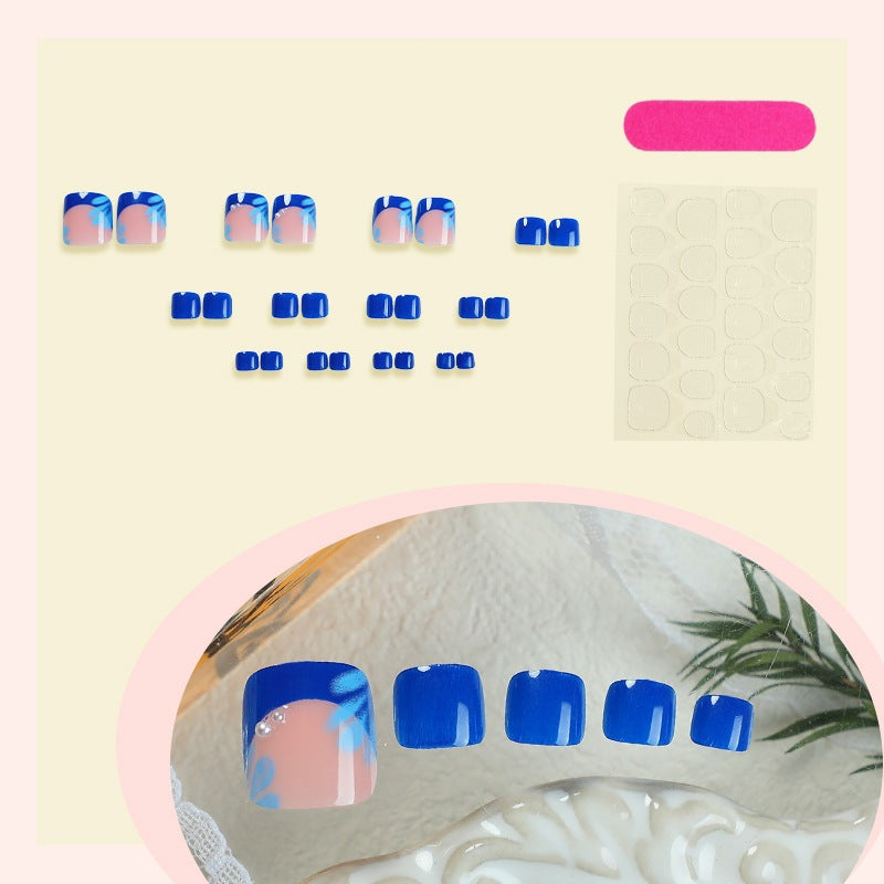 Artificial nail set with spring-like flower designs and sparkling accents Stornfield