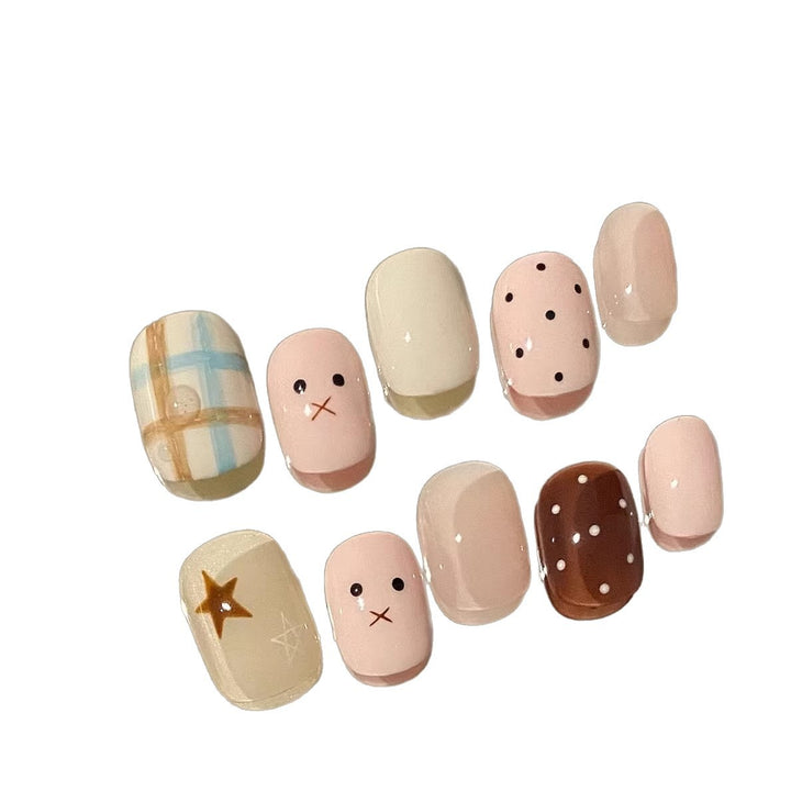 Artistic Press-On Nail Art Set with Whimsical Designs