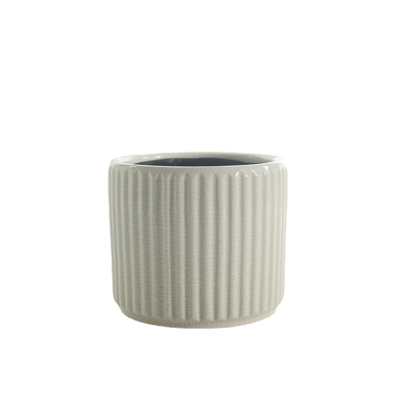 Elegant ceramic flower pot with ribbed structure Stornfield