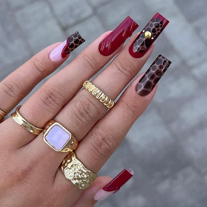Artistic Press-On Nail Set with Decorative Patterns Stornfield