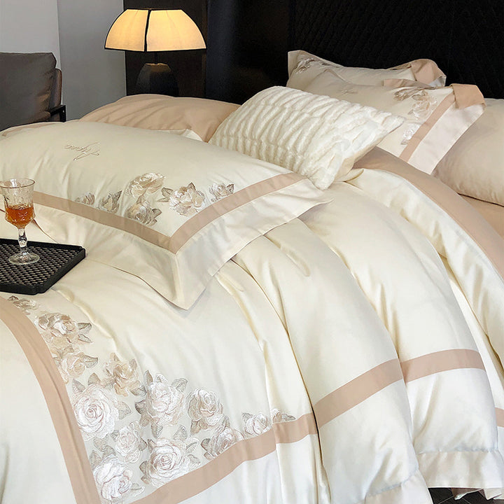Hotel-style bedding set made of cotton satin with embroidered rose relief and fine border