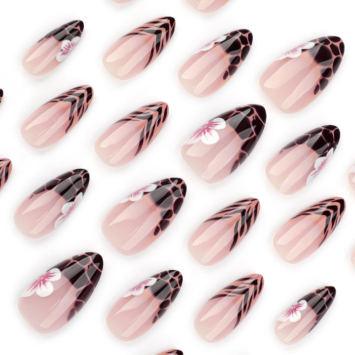Artful Stiletto nails with floral accent Stornfield