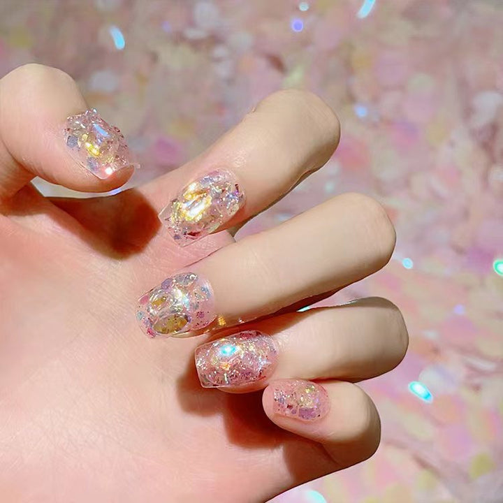 Artful nail tips with glitter accents Stornfield