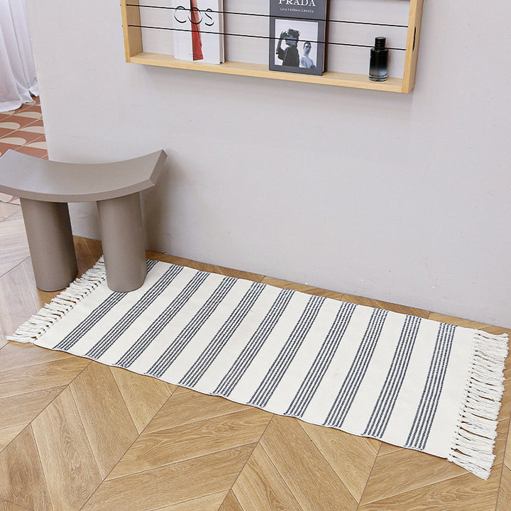 Woven cotton blend bath mat in buffalo check with flat weave structure Stornfield