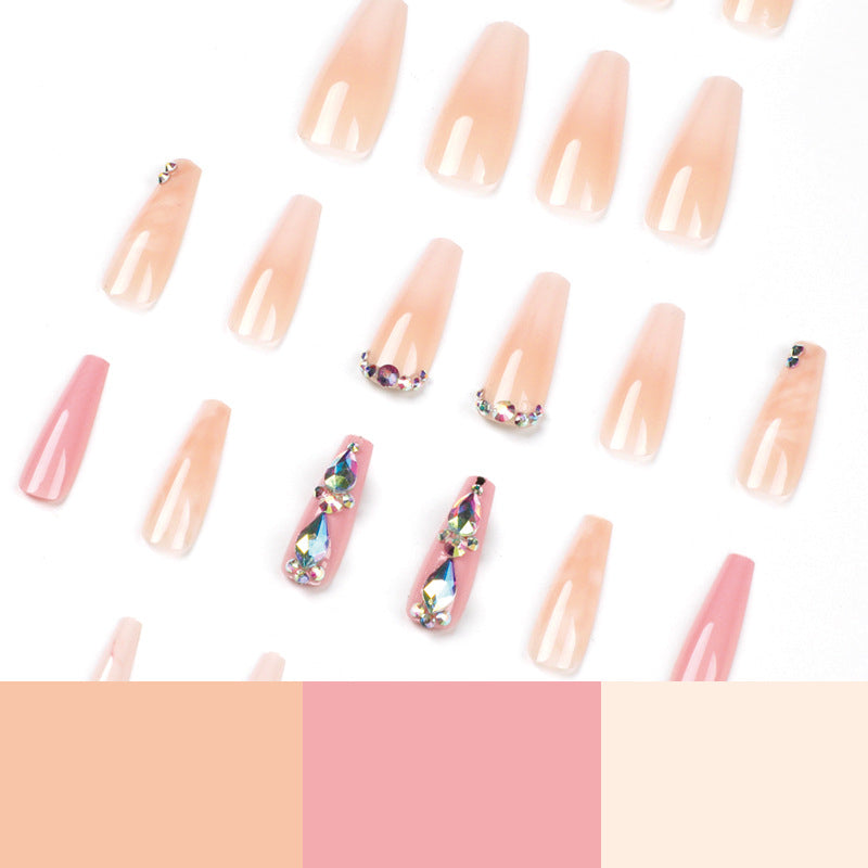 Glamorous artificial nails with gemstone embellishments Stornfield