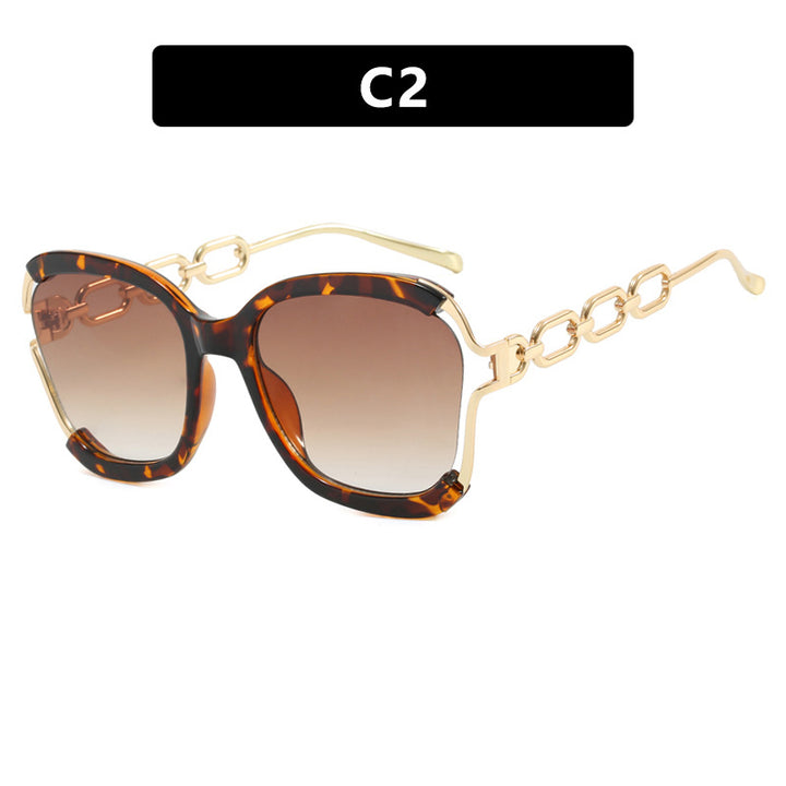 Ladies fashionable sunglasses with golden chain details Stornfield
