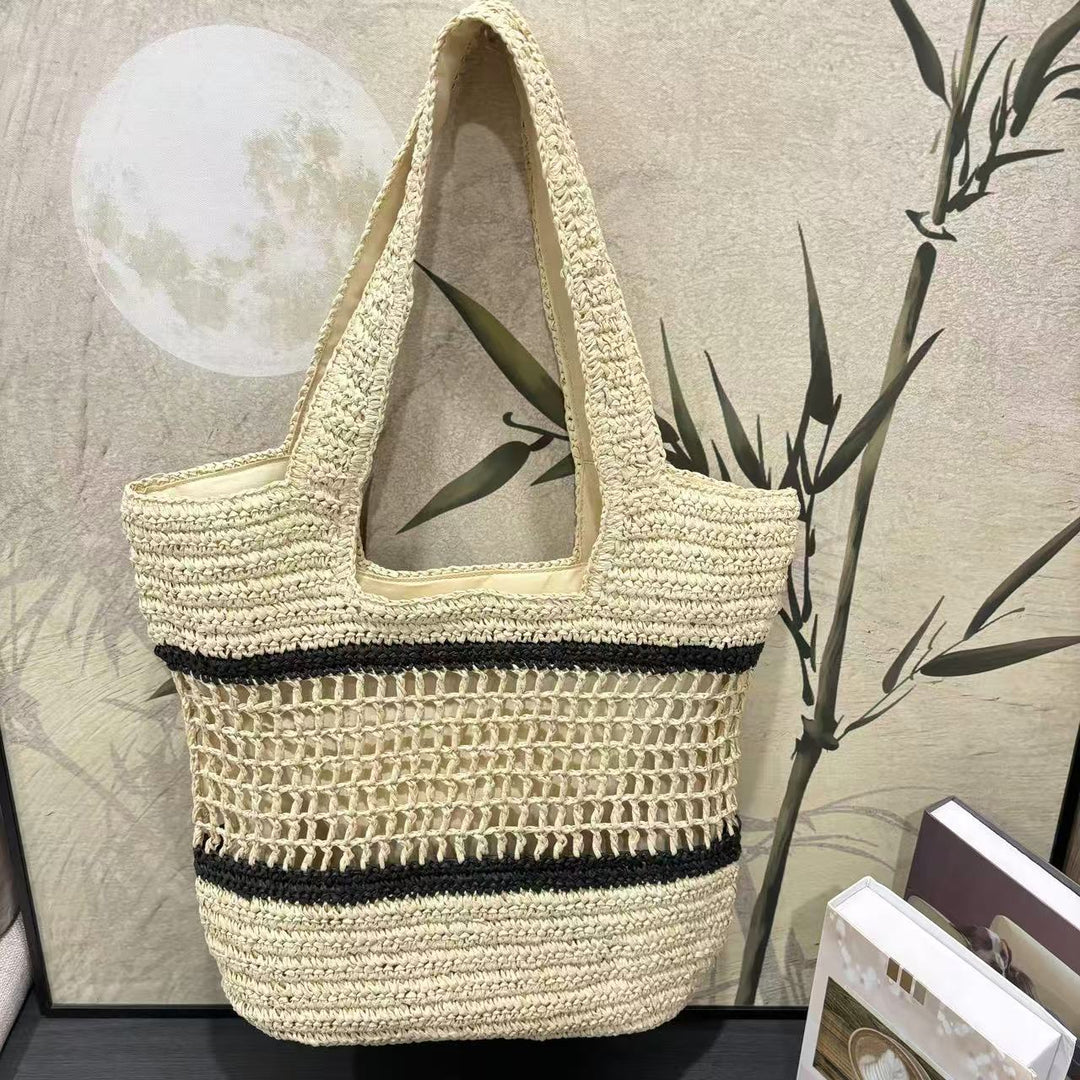 Woven natural material handbag with elegant structure Stornfield