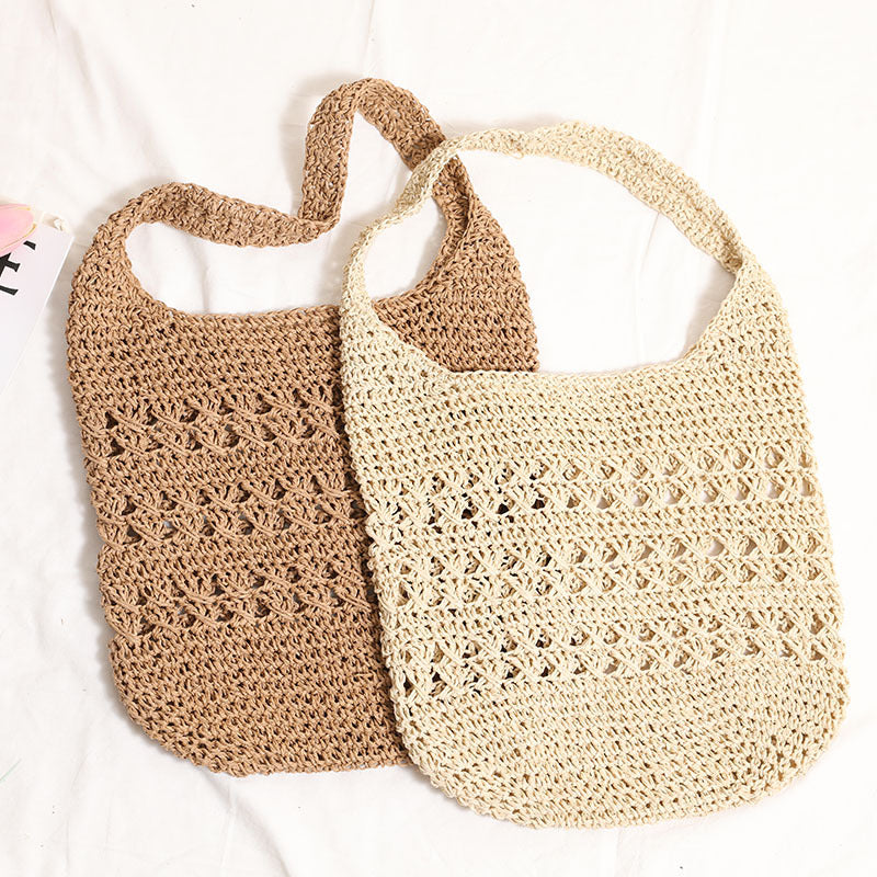 Crocheted shoulder bag with decorative hole pattern Stornfield